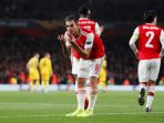 Gelandang Arsenal, Dani Ceballos merayakan selebrasi pasca membobol gawang Standard Liege dalam laga kedua Grup F Liga Europa 2019-2020, Jumat (4/10) dini hari WIB | REUTERS/David Klein